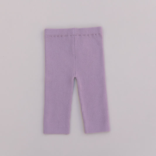 A pair of mauve organic cotton leggings for babies or toddlers, displayed against a white background.